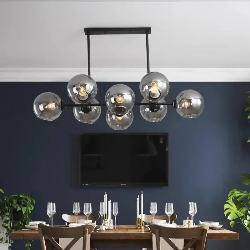 Modern black metal pendant light with seven reflective silver led glass ball shades by DecorBites LED Glass