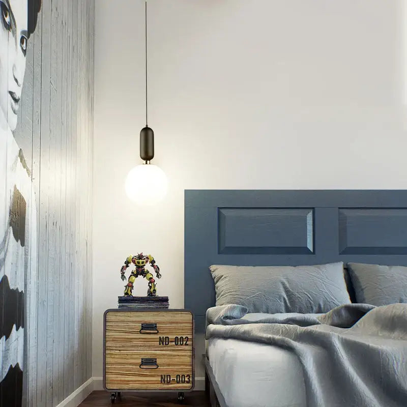 Decorbites led glass pendant lights featuring a matte black cylindrical fixture with a white led glass ball bulb