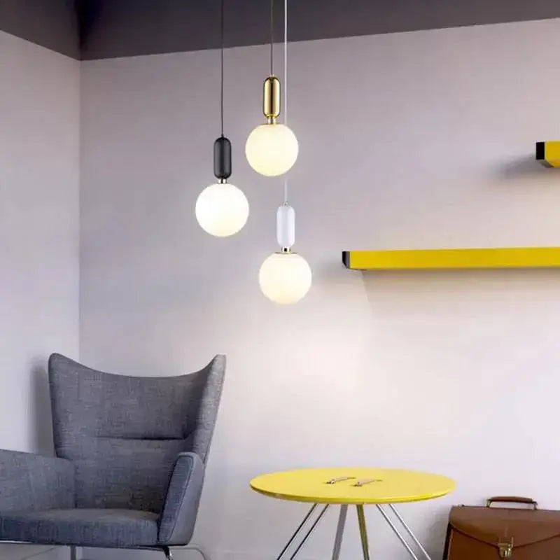 Modern pendant lights with frosted glass globes and brass accents from decorbites led glass ball pendant lights