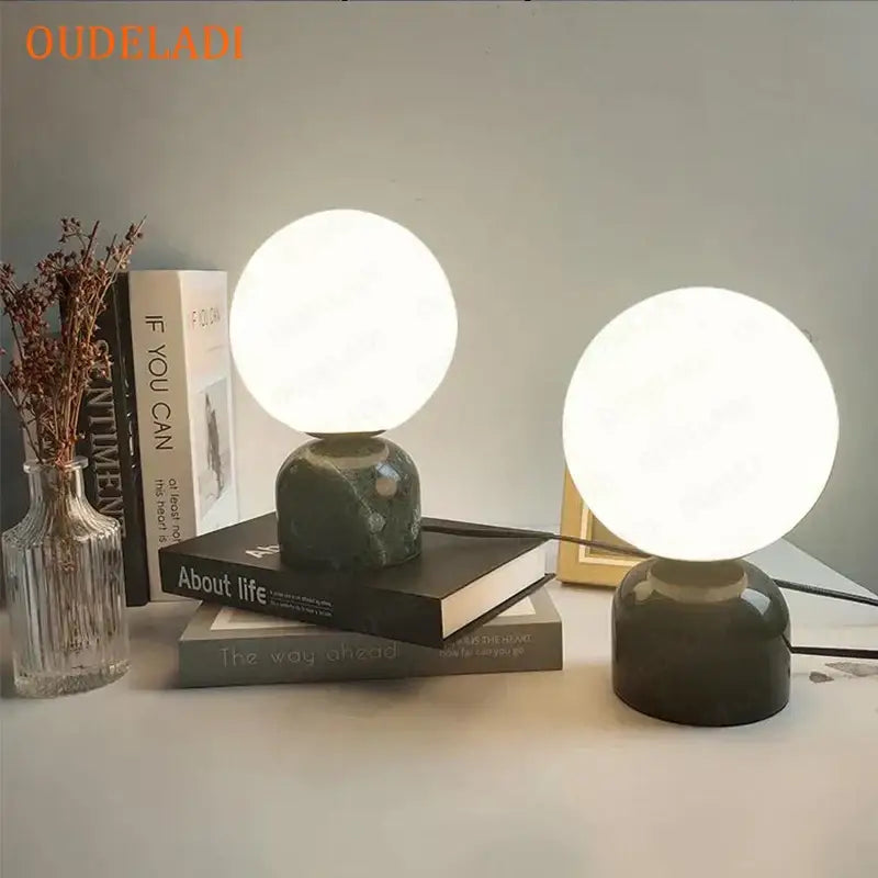 Two spherical frosted glass globe lamps with dark green marble bases decorbites led glass table lamp for home lighting
