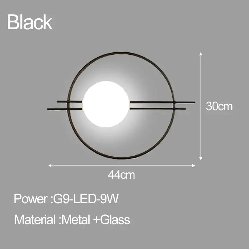 Black circular decorbites led glass ball wall sconce with glowing central led bulb and metal arm frame for bedroom or living room