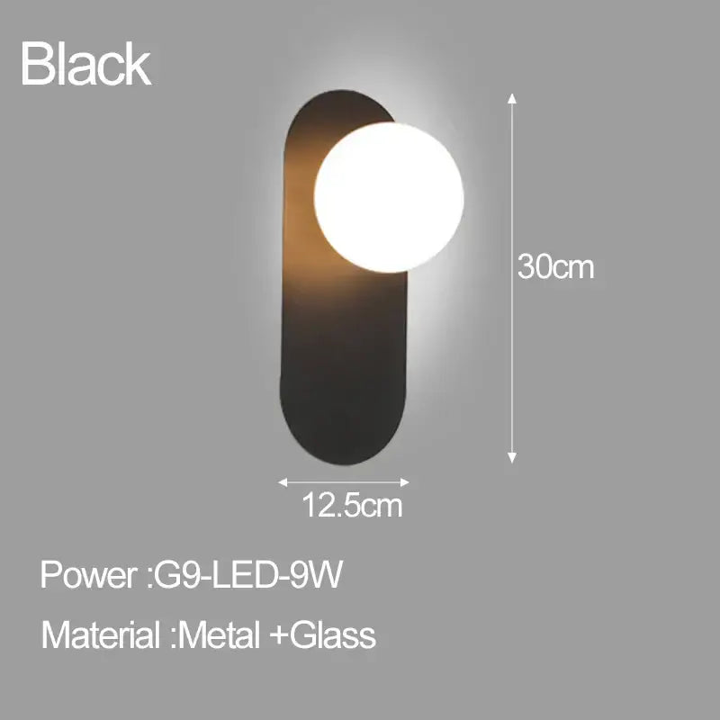 Black modern DecorBites LED glass ball wall sconce with oval metal base and round illuminated glass globe for living room