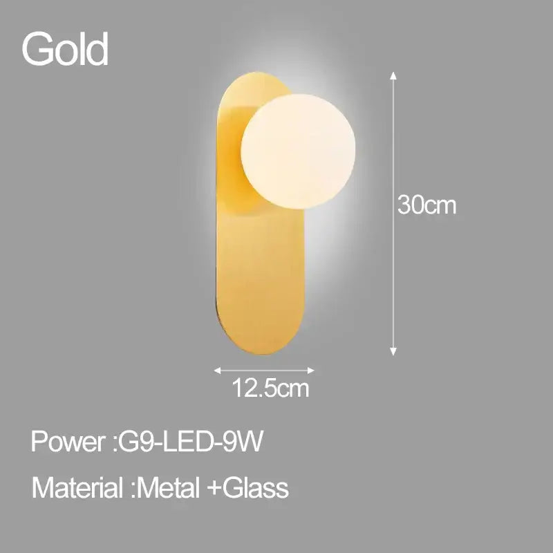 Gold-finished decorbites led glass ball wall sconce with elongated metal base and round diffuser for bedroom or living room