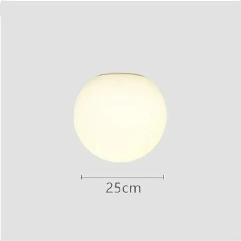 A sleek 25cm diameter decorbites led glass ball wall sconce emitting a soft diffused white glow for ceiling use