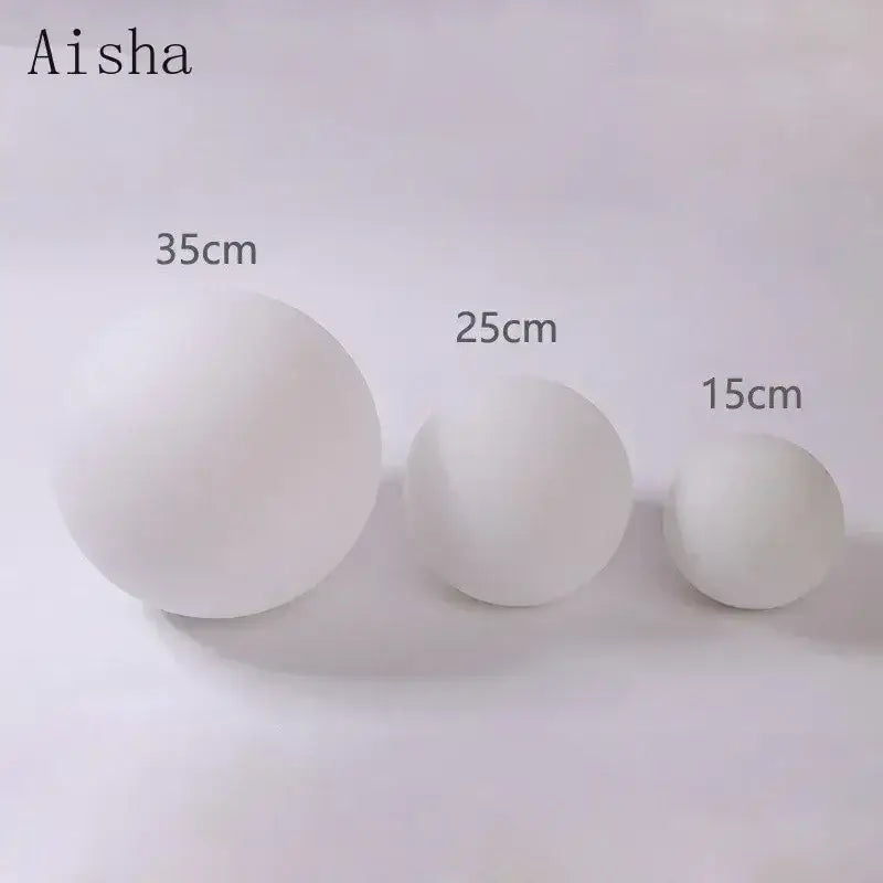 Three white matte led glass ball wall sconce lights by decorbites in sizes 15cm 25cm and 35cm
