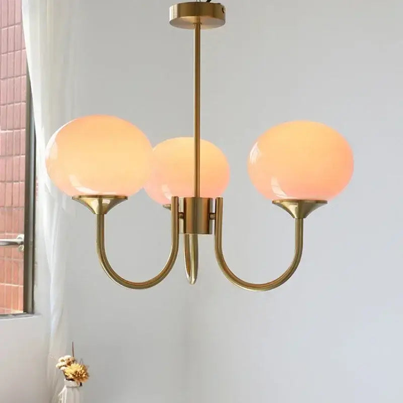 Brass-finished decorbites led glass chandelier with three warm-toned frosted glass balls for home decor lighting