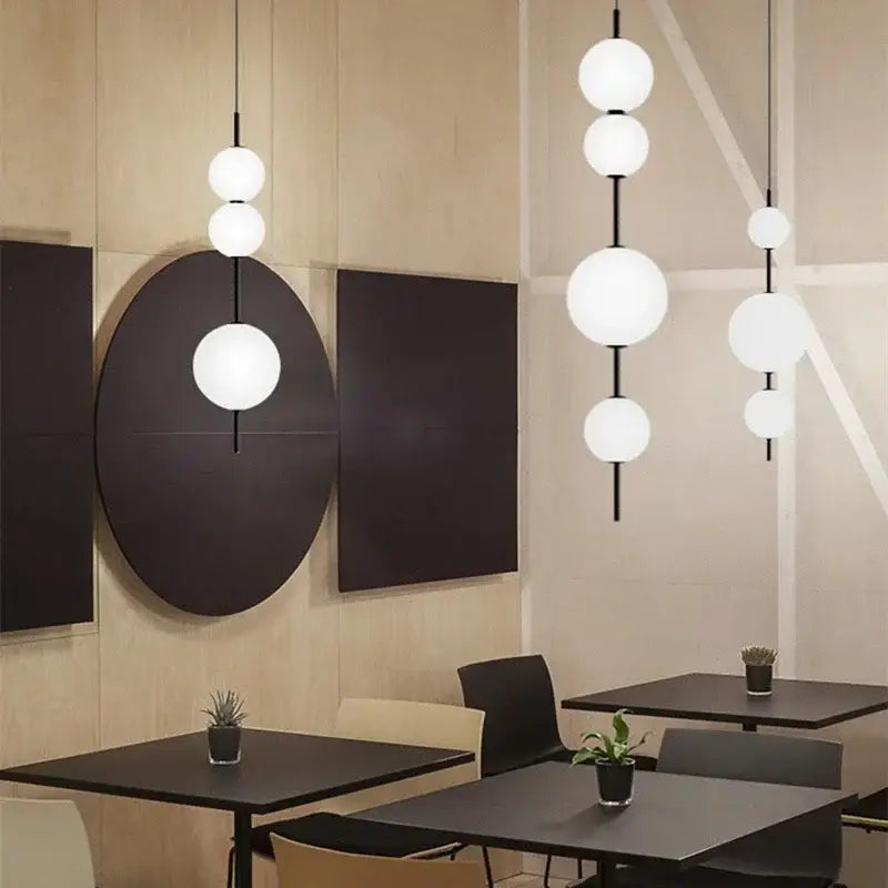 Modern white spherical decorbites led glass beads pendant chandelier with black rods for elegant hanging lighting fixture