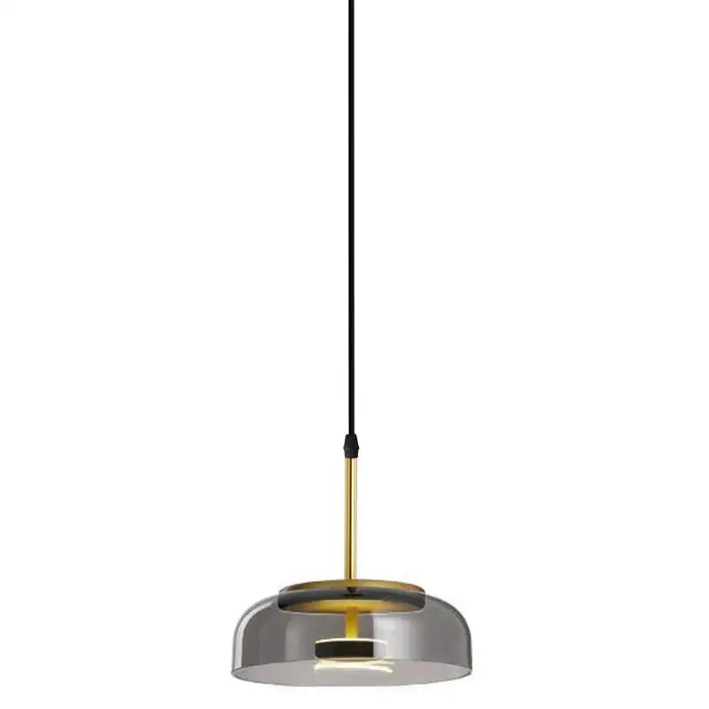 A modern pendant light with a sleek smoked glass dome and brass accents from DecorBites led glass bowl