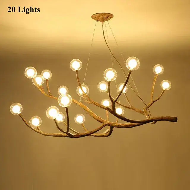 Decorbites led glass bubble chandelier featuring a rustic branch design with 20 warm-tone globe bulbs for loft lighting