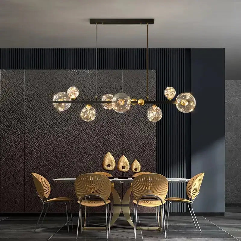 Modern gold and black decorbites led glass pendant light with spherical bulbs and sleek metal frame for elegant decor