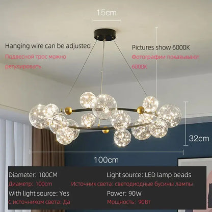 Modern pendant light featuring decorbites led glass bulb with gold and black metal accents and gypsophila string design