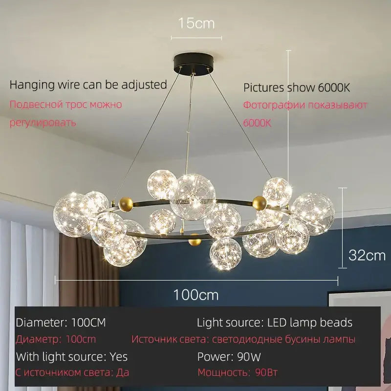 Modern pendant light featuring decorbites led glass bulb with gold and black metal accents and gypsophila string design