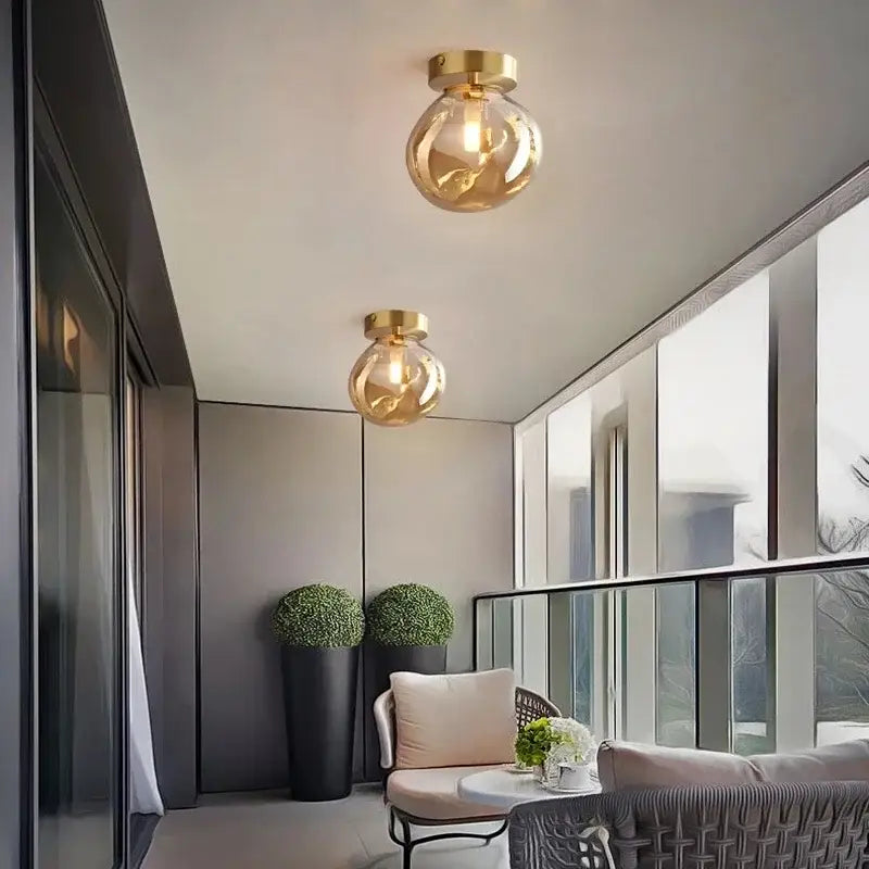Decorbites led glass spherical ceiling chandelier with gold finish and warm amber glow for indoor lighting