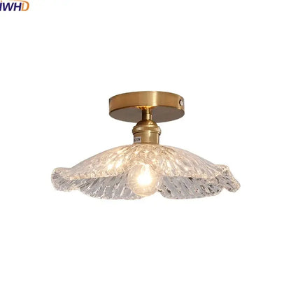 DecorBites™ LED glass ceiling lamp with brass-finished metal base and ornate textured clear glass ceiling shade