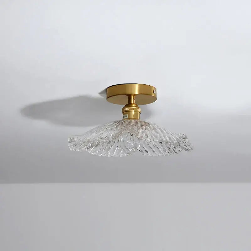 DecorBites™ LED glass ceiling lamp with a clear textured glass lampshade and gold-toned metal base for indoor use