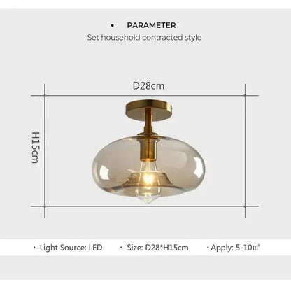 A modern decorbites led glass ceiling light pendant with frosted glass shade brass fixture and exposed led bulb