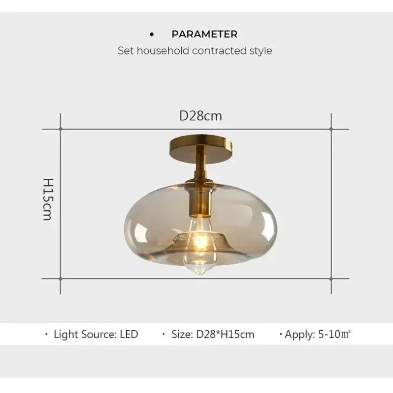 A modern decorbites led glass ceiling light pendant with frosted glass shade brass fixture and exposed led bulb