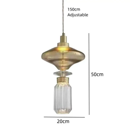 A modern decorbites led glass chandelier with clear amber glass and gold-toned metal fixture on an adjustable wire