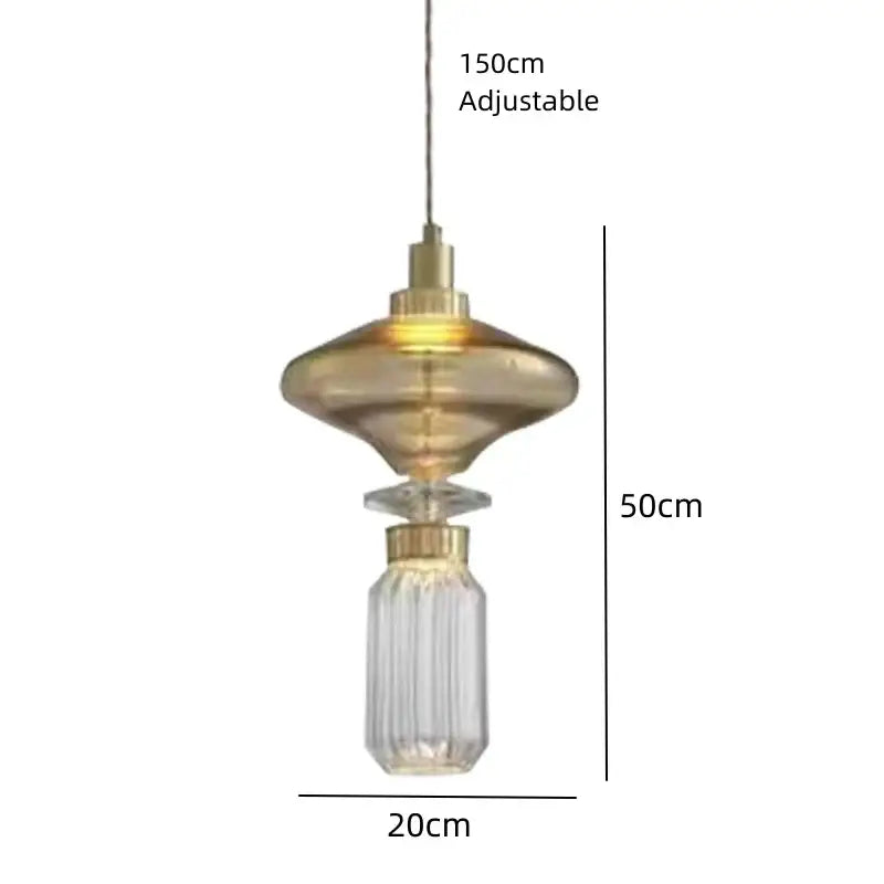 A modern decorbites led glass chandelier with clear amber glass and gold-toned metal fixture on an adjustable wire