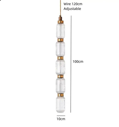Decorbites led glass chandelier with five clear amber glass cylinders and gold-toned rings on adjustable wire