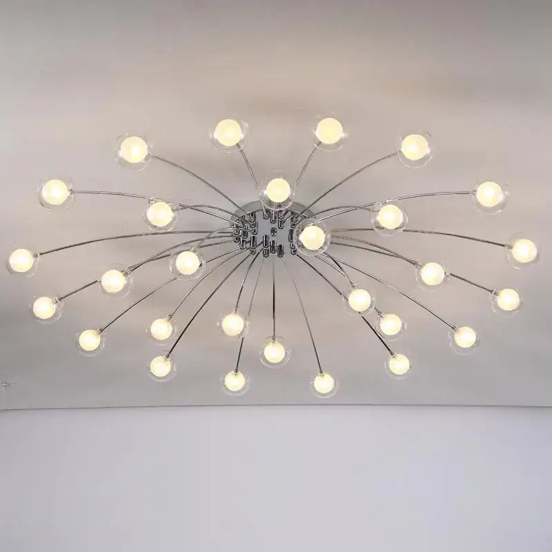 Modern chrome-finished decorbites led glass chandelier with clear globe bulbs in a starburst design for home decor