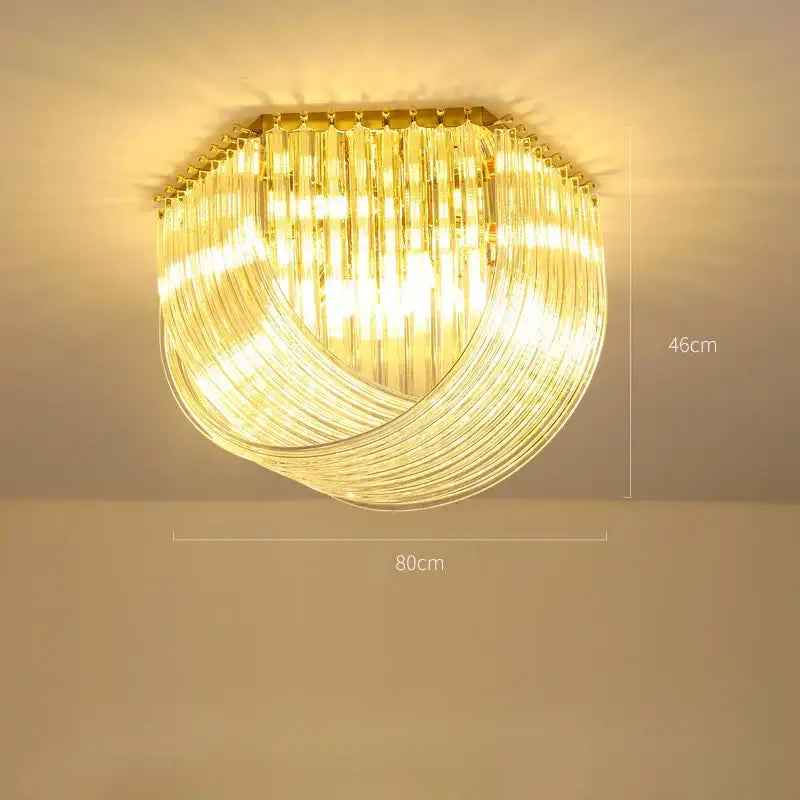 Golden-framed decorbites led glass chandelier with cascading clear glass rods in modern stainless steel foyer design