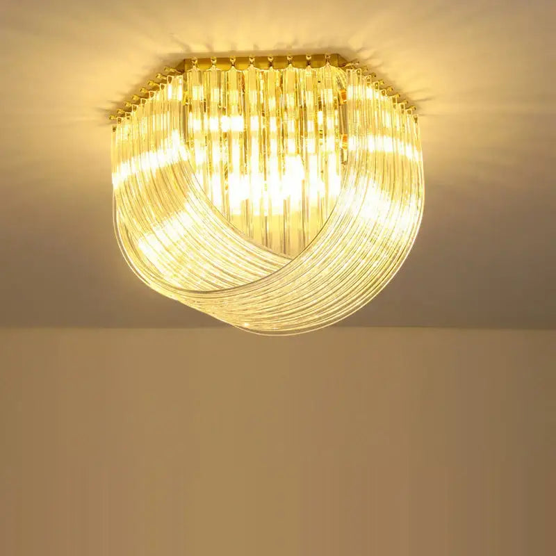 DecorBites led glass chandelier with golden frame and cascading clear glass tubes for modern foyer lighting