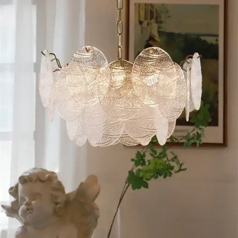 DecorBites LED glass chandelier with a delicate translucent scalloped design and gold-toned metal accents