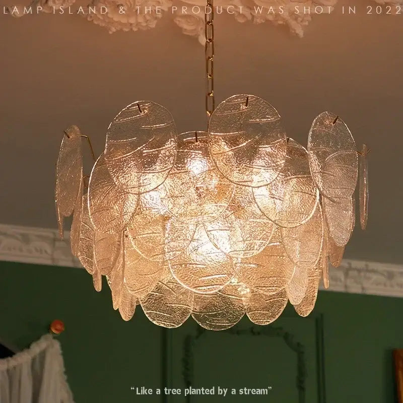 DecorBites led glass chandelier with leaf-shaped translucent panels and golden chain suspension modern minimalist design