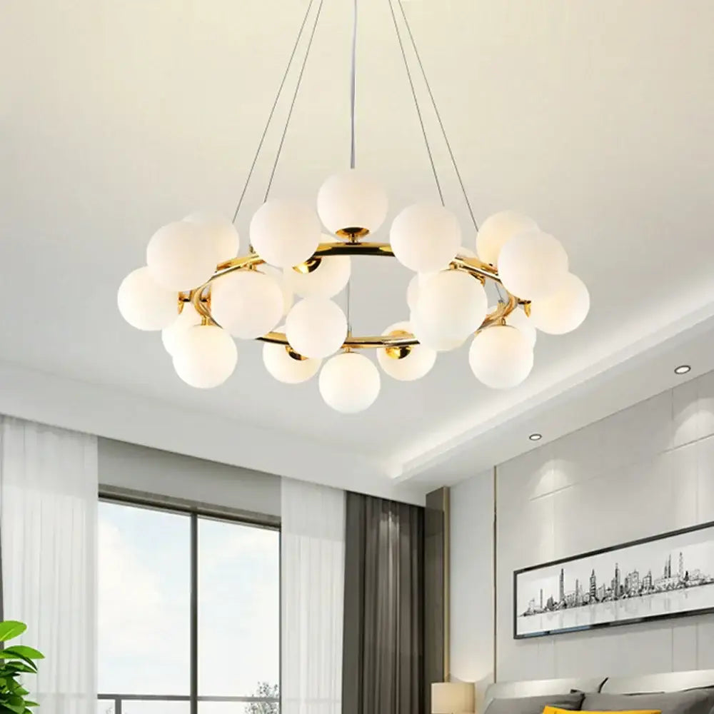 Gold-toned DecorBites LED glass chandelier pendant lamp with frosted globe bulbs for living room and dining lighting