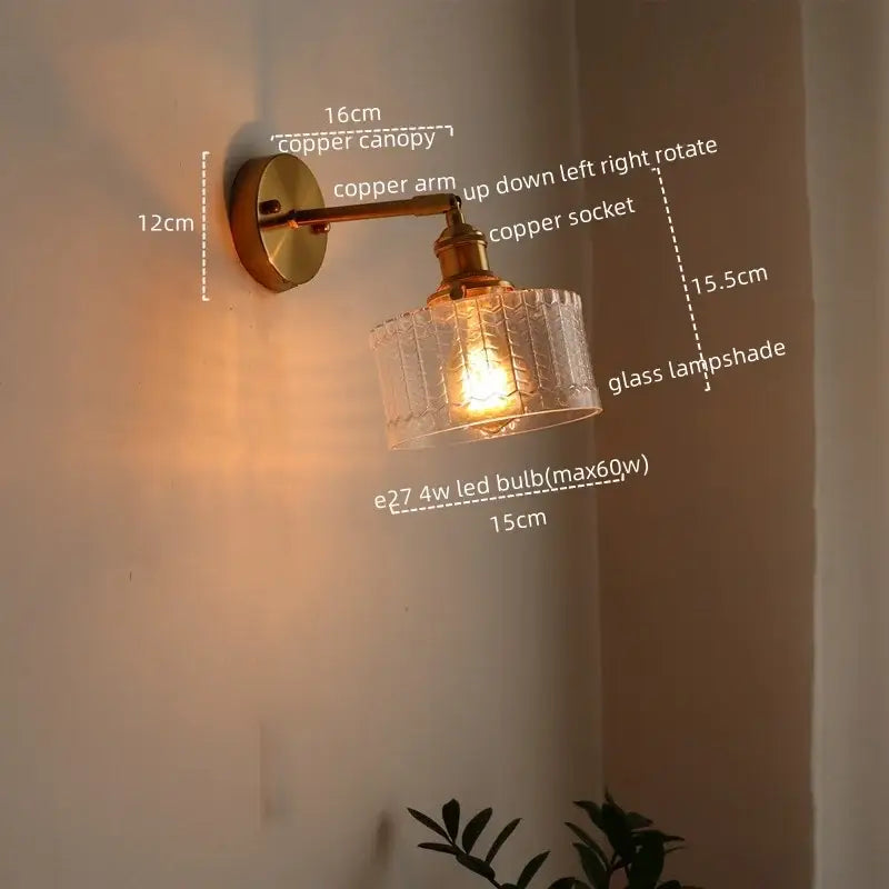 Decorbites™ antique brass-finished copper wall sconce with textured glass lampshade and pull chain switch