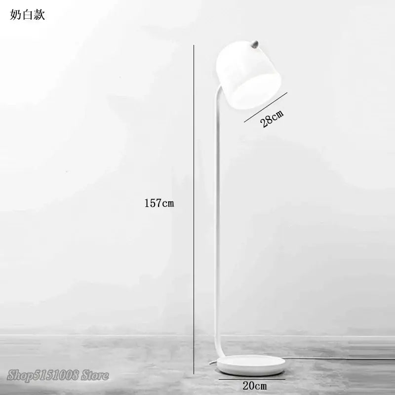 Minimalist white decorbites led glass floor lamp with curved metal stand and frosted glass shade for modern living rooms