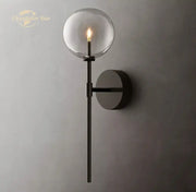 Modern black metal wall sconce with glass globe and exposed filament bulb for indoor decorbites led glass lighting