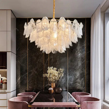 Elegant white led glass hanging pendant light with gold-toned chain by DecorBites LED Glass above dining table
