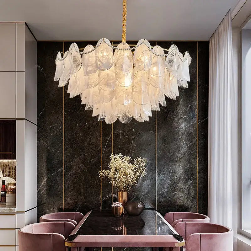 Elegant white led glass hanging pendant light with gold-toned chain by DecorBites LED Glass above dining table
