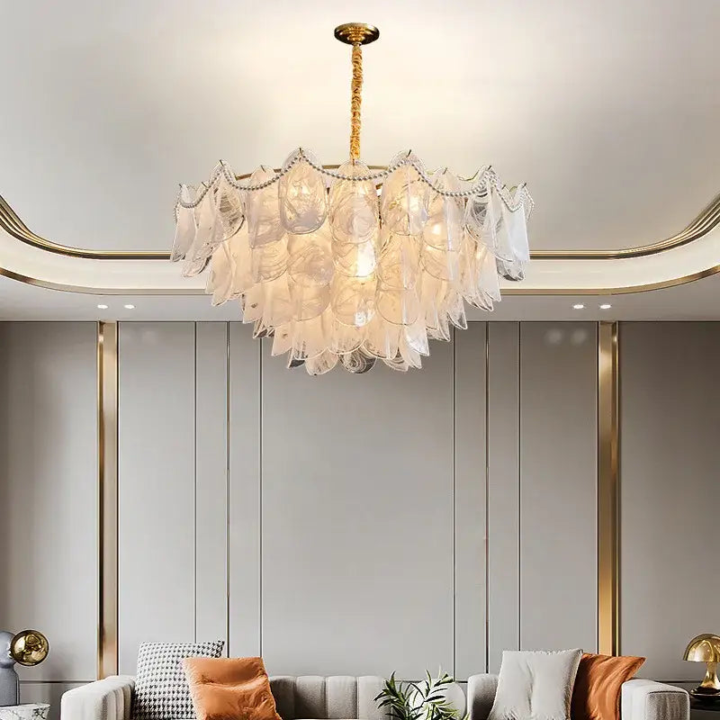 Elegant gold-toned decorbites led glass pendant light with layered translucent shell-like shades for modern decor