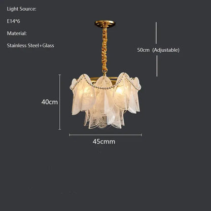 A delicate translucent white glass decorbites led glass pendant light with gold stainless steel frame and adjustable chain