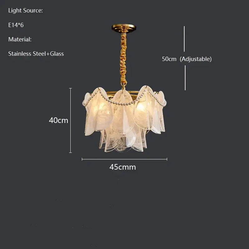 A delicate translucent white glass decorbites led glass pendant light with gold stainless steel frame and adjustable chain