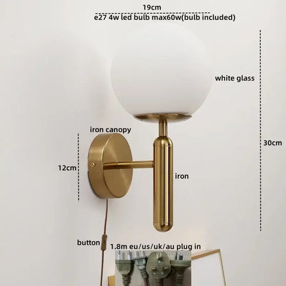 A modern DecorBites LED glass iron wall light with brass base and frosted globe for corridor or living room