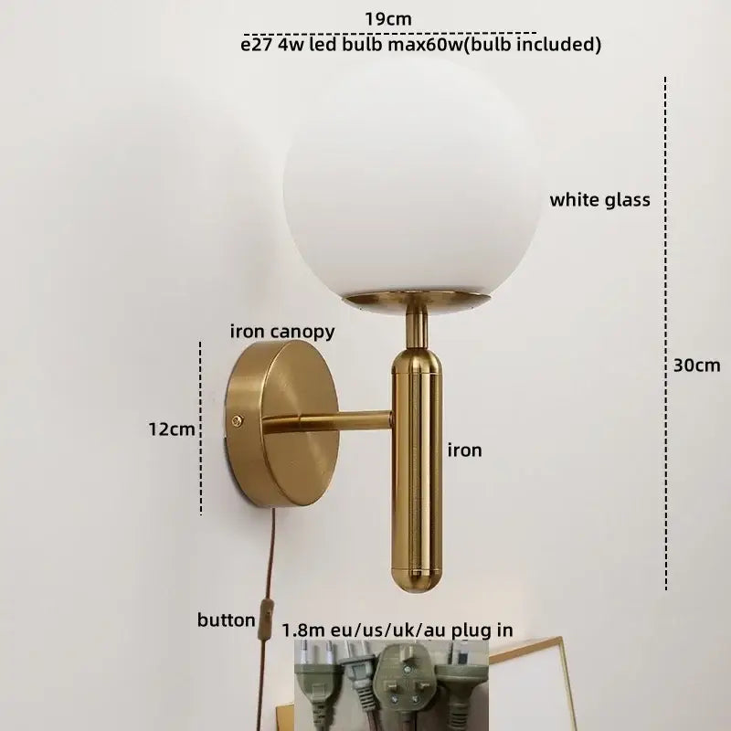 A modern DecorBites LED glass iron wall light with brass base and frosted globe for corridor or living room