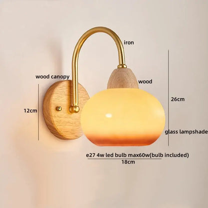 Decorbites™ warm-toned glass wall light fixture with brass iron arm and wooden canopy for modern bedside use