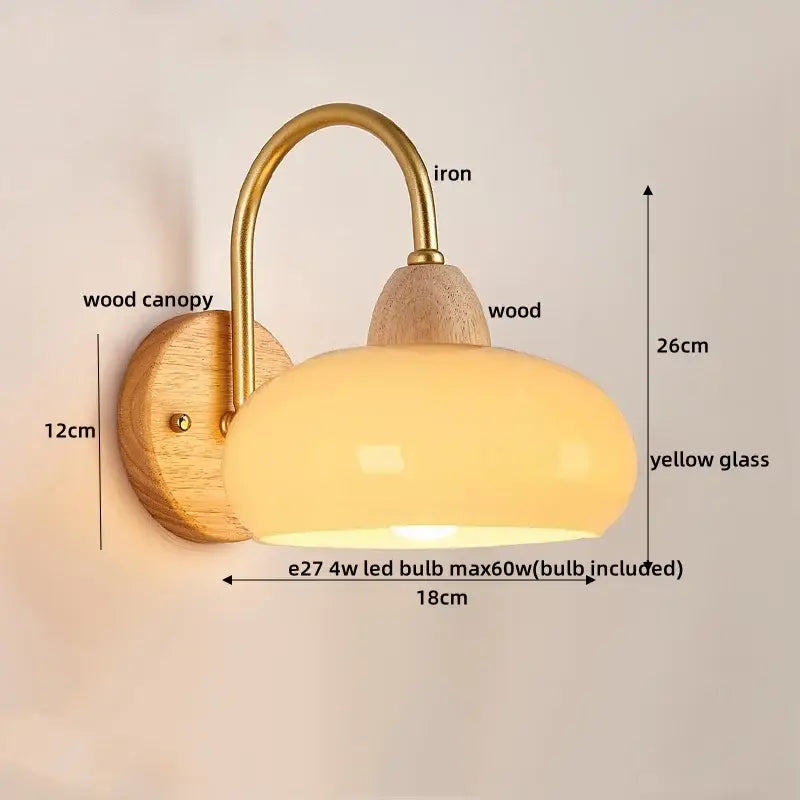 Decorbites™ warm yellow glass wall light fixture with curved brass iron arm and wooden canopy for modern bedside use