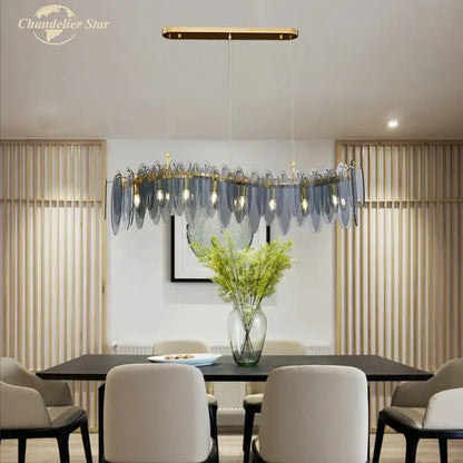 Modern blue glass chandelier with gold-toned decorbites led glass metal leaf frame for luxury home lighting