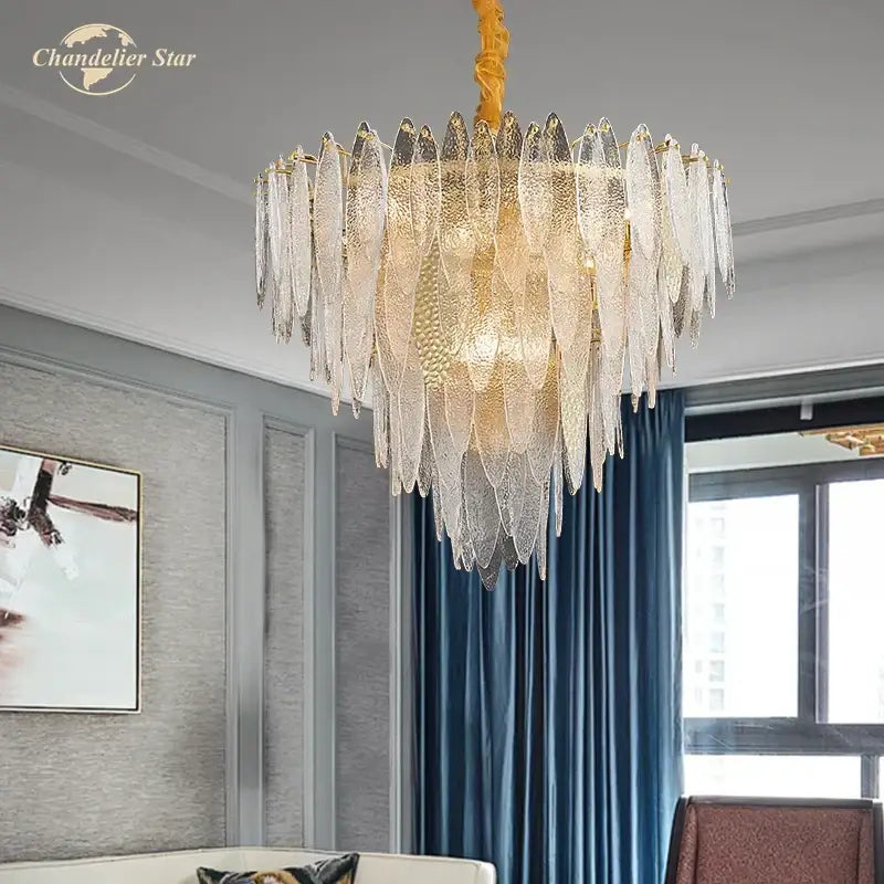 Gold-toned decorbites led glass metal leaf chandelier with cascading textured glass shades for luxury home decor