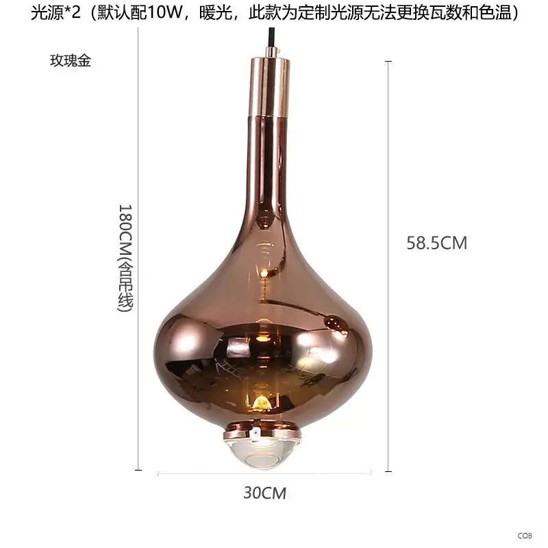 A sleek rose gold-toned decorbites led glass pendant chandelier with bulbous teardrop shape and metallic accents