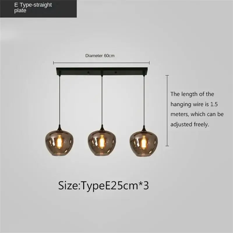 Modern three-light decorbites led glass pendant chandelier with black metal mount and warm smoked glass shades for kitchen bar
