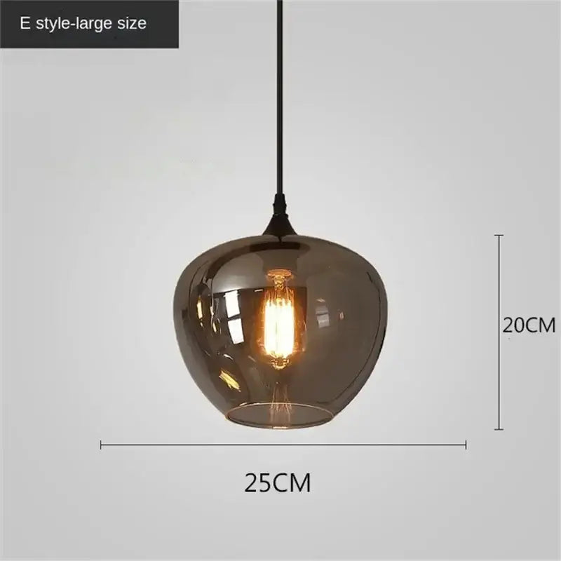 A sleek dark amber led glass pendant chandelier with vintage edison bulb from decorbites for kitchen dining bar décor