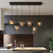 Modern black rectangular decorbites led glass pendant chandelier with five warm-toned glass lights for kitchen dining bar décor