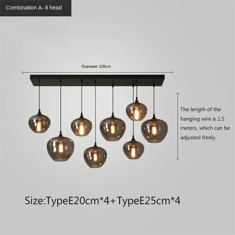 Modern black metal DecorBites LED glass pendant chandelier with eight adjustable amber and clear frosted globe lights for kitchen dining bar décor