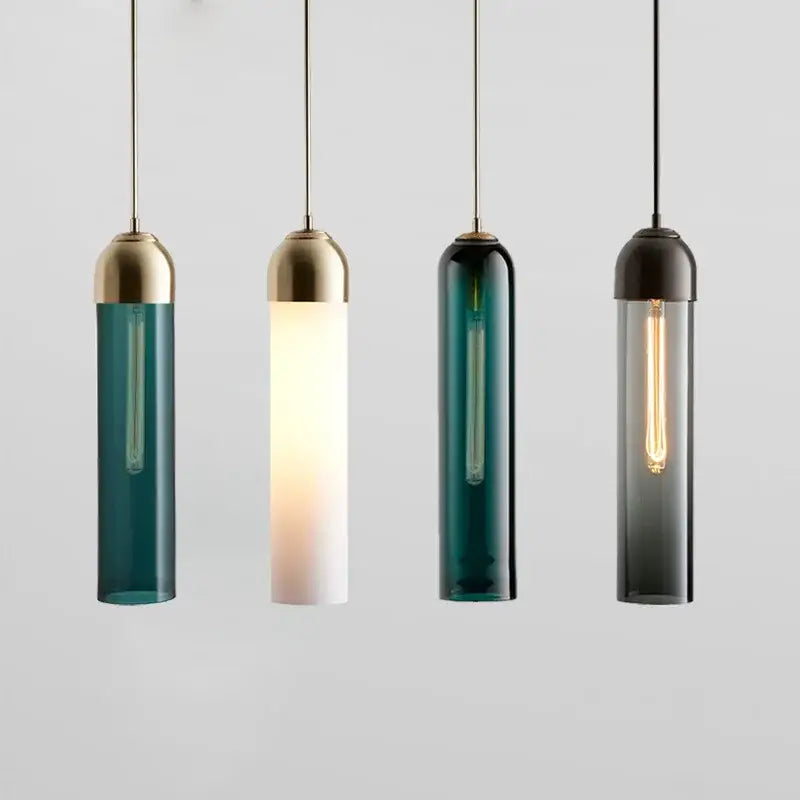 Four cylindrical decorbites led glass pendant lights with brass caps in teal white dark green and smoked gray for chandelier
